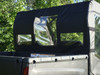 Close-up of the 3 Star rear window in black fabric with two clear panes above the Polaris Ranger 570-3 bed