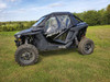 Passenger side front angle of the Polaris RZR Pro XP with the 3 Star soft enclosure doors and clear windows
