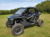 3 Star one-piece windshield on a black Polaris RZR Pro XP, front three-quarter view in a field
