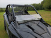 Close view of the 3 Star half windshield on a black Polaris RZR Pro XP from the passenger side, roll cage above