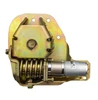 Kolpin power angle actuator uncovered showing the zinc-plated gear bracket and electric motor, on white