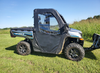 3 Star soft doors kit installed on a gray CF Moto UForce 1000, driver side view in a mowed field