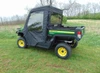 Rear three-quarter view of the Gator XUV 835/865 with the 3 Star soft rear window and doors