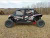 3 Star soft doors kit installed on a red and gray Polaris RZR XP-4 Turbo-S, full side view in a field
