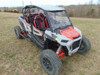 Front three-quarter view of a gray and red Polaris RZR XP 4 Turbo S with the 3 Star tinted Lexan roof