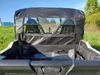 Rear view from the bed of the 3 Star black soft rear window panel with clear window on a Yamaha Wolverine RMAX2