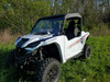 3 Star black soft top on a white Yamaha Wolverine RMAX2, front 3/4 view in a grassy field