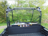 Rear view of the 3 Star Lexan back panel on a John Deere Gator HPX/XUV seen from the cargo bed