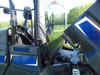 3 Star rear window panel strapped to the cage of an Arctic Cat Stampede with the cargo bed tilted up
