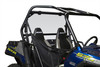 Kolpin clear rear window on a Polaris RZR roll cage, three-quarter view behind the two seats