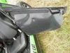 Arctic Cat Wildcat Trail door hinged open showing the black lower door insert panel from inside the cab