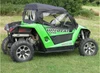 Rear three-quarter view of a green Arctic Cat Wildcat Trail with the 3 Star cab enclosure, top and rear window zipped