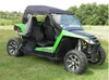 Driver side view of an Arctic Cat Wildcat Trail with the 3 Star top installed and the door opening uncovered, seat visible