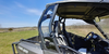 Side view of the Can-Am Commander showing the 3 Star Lexan rear window behind the cab with the roof and doors