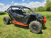 Driver side front three-quarter view of a black Can-Am Maverick X3 with the 3 Star soft top and orange trim