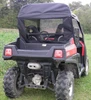 Rear view of a red Hisun 500/700 with the 3 Star soft top and clear rear window closing off the cab