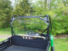 Rear view from behind the tailgate of the 3 Star Lexan back panel on the John Deere Gator XUV with vent slots