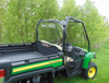 Rear three-quarter view of the green and yellow John Deere Gator XUV with the 3 Star Lexan back panel behind the seat
