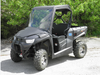 Passenger side front view of a black Kymco UXV 700 with the 3 Star vinyl windshield and top combo