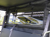 3 Star soft back panel with clear window seen from inside the cab of a Kawasaki Mule ProMX, straps and cage behind
