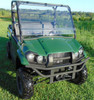 3 Star 2-piece windshield installed on a green Kawasaki Mule ProMX, front three-quarter view