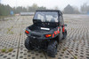 Polaris RZR 570 hard cab enclosure by HardCabs - steel roof, tilt-out glass windshield, poly doors