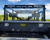 3 Star one-piece Lexan back panel with vent slots on a Polaris Ranger, rear view above a diamond plate toolbox