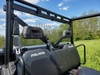 Driver side rear angle of the 3 Star Lexan back panel installed behind the seats of a Polaris Ranger