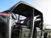Close view under the 3 Star soft top on a Polaris Ranger 570-4 crew showing the cab, seats and open sides