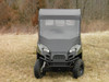 Front view of a Polaris Ranger 570-4 with the 3 Star vinyl windshield and top enclosure, parked on grass
