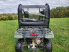 3 Star soft back panel with clear vinyl window closing off the cab of a green Honda Pioneer 500, rear view