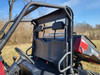 View from inside the cab of the 3 Star soft back panel behind the bench seat and roll cage of the Hisun Sector 450