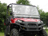 Small photo of the 3 Star windshield on a red Polaris Ranger, front three-quarter view in a yard
