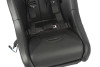 Angled close-up of the Pro Armor harness buckle and red release button on the seat cushion