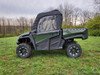 3 Star soft doors and rear window on a green Intimidator GC1K, black doors with clear windows, side view in a field