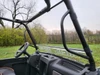 View from inside the Intimidator GC1K cab looking through the 3 Star 2-piece windshield at the steering wheel