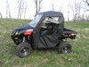 3 Star soft doors installed on a black Arctic Cat Prowler, driver side view parked on a grassy hill