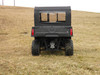 3 Star rear window panel on a Polaris Ranger Mid-Size Crew, straight rear view over the cargo bed in a winter field