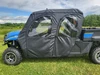3 Star soft doors with clear windows on a blue New Holland 850 Crew, driver side profile on grass