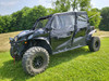 3 Star upper doors on a black Can-Am Maverick Sport Max, driver side front three-quarter view in a grassy field