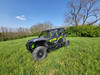 3 Star soft upper doors on a gray and green Honda Talon 4-seater, wide front three-quarter view in a field