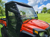 3 Star two-piece windshield with vented lower strip on an orange Bad Boy Bandit, front three-quarter view