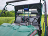 View over the hood of a green 1999 Polaris Ranger showing the 3 Star rear panel window behind the bench seat