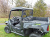 3 Star soft top installed on a gray side-by-side with cargo bed, rear three-quarter view on a lawn