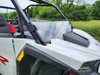 3 Star half windshield on a white Polaris RZR XP 1000, close driver side view of the clear panel and cage clamp