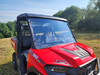 3 Star 1-piece general purpose windshield installed on a red TGB LandMax 1000, front three-quarter view