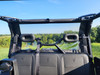 Inside view of the 3 Star canvas back panel clear window behind the Segway UT10 Crew rear seats and headrests