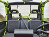 3 Star soft back panel on a Segway UT10 viewed from inside the cab, clear window behind the seats and green cage