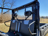 3 Star soft back panel with clear window behind the seats of a CFMoto UForce 600, seen from the bed