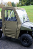 Greene Mountain olive cab enclosure with clear windows on a mid-size Polaris Ranger, side view on grass